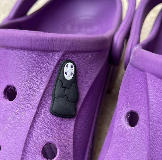 no face crocs charm