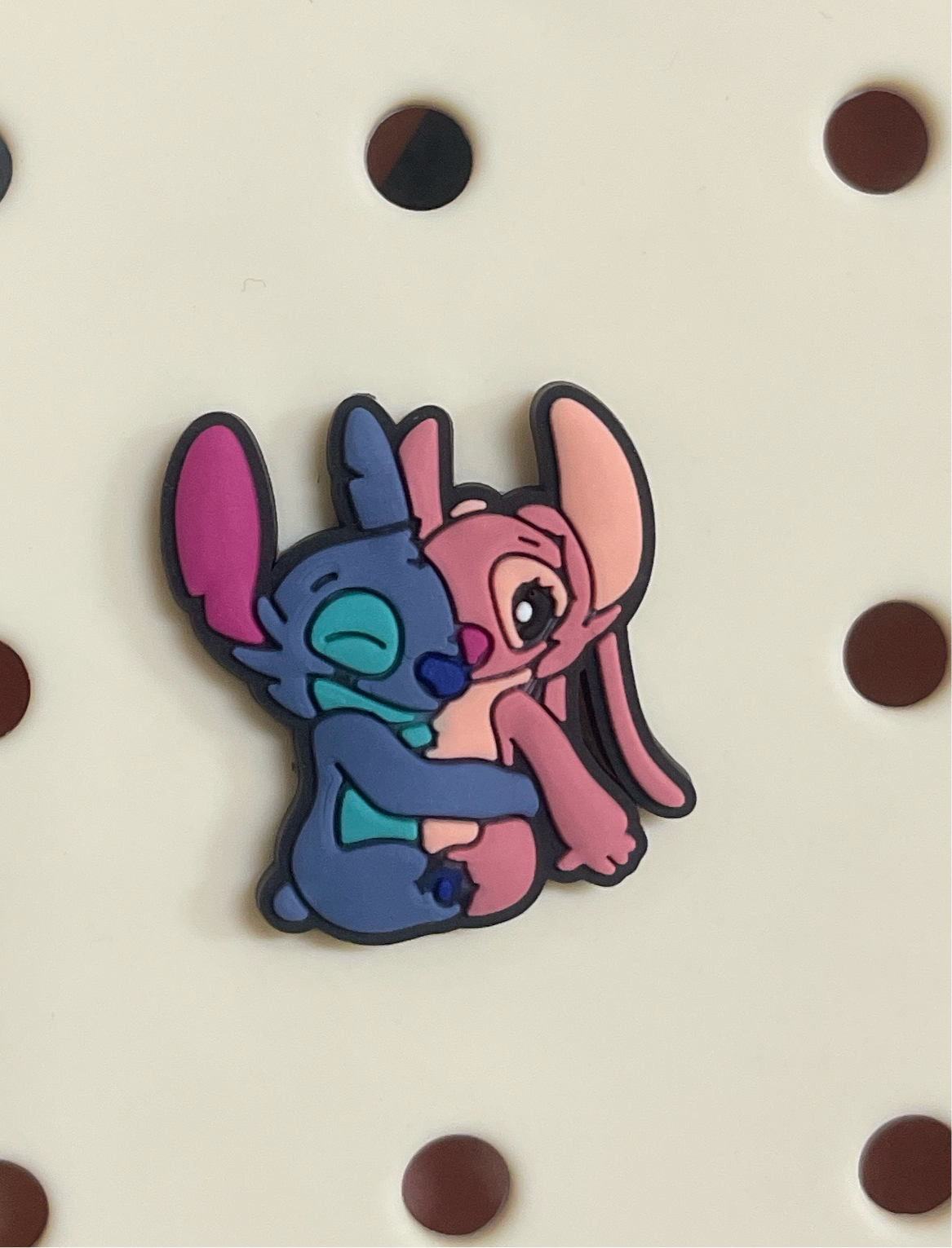 Stitch and angel charm