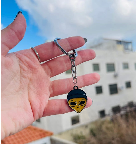 Alien wearing a hat keychain