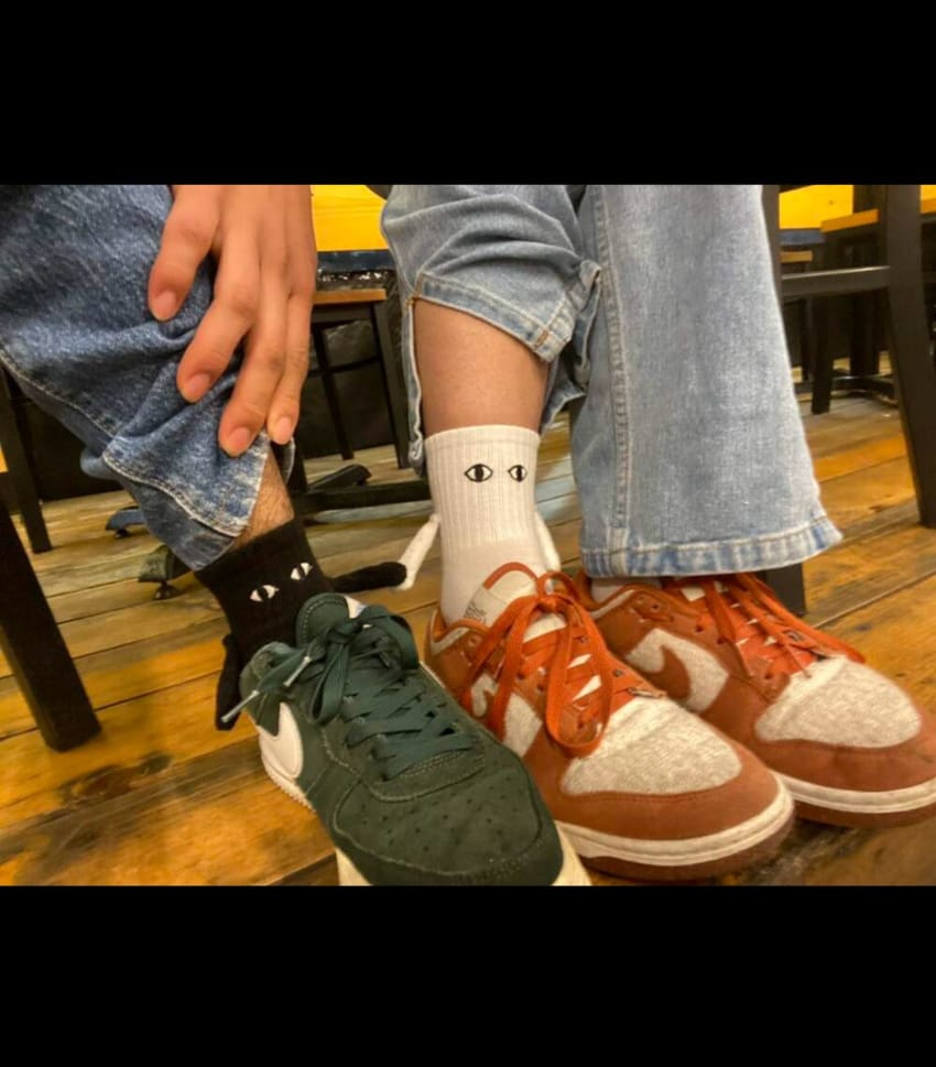 Holding hands matching socks