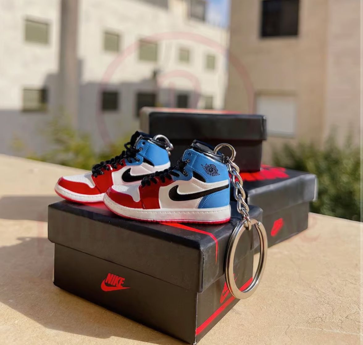 Blue and red mini nike shoe keychain